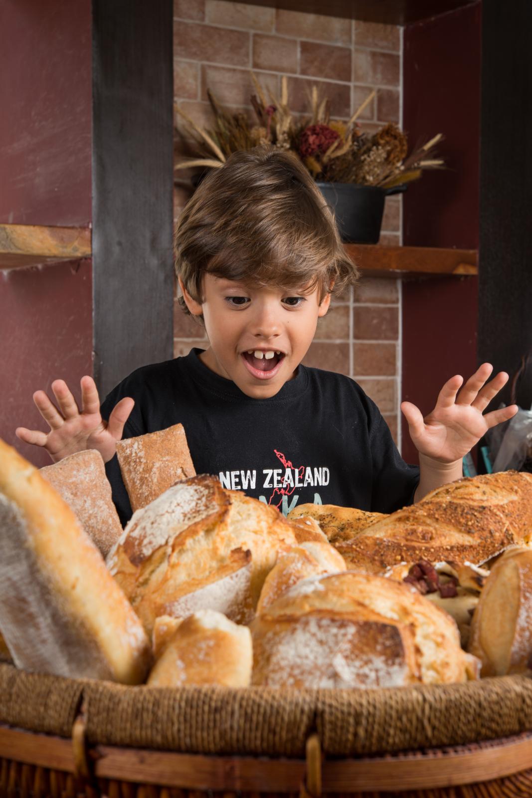 Lifestyle — boy excited at bread basket